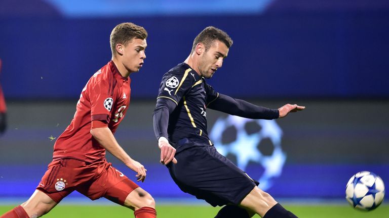 Joshua Kimmich vies with Ivo Pinto 