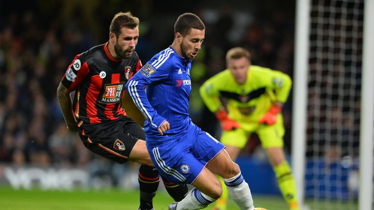 Chelsea's Eden Hazard (R) holds off Bournemouth  defender Steve Cook