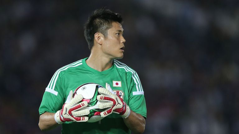 Goalkeeper Eiji Kawashima #1 of Japan looks to throw the ball out during the international friendly match between Japan and Iraq, 11 June 2015