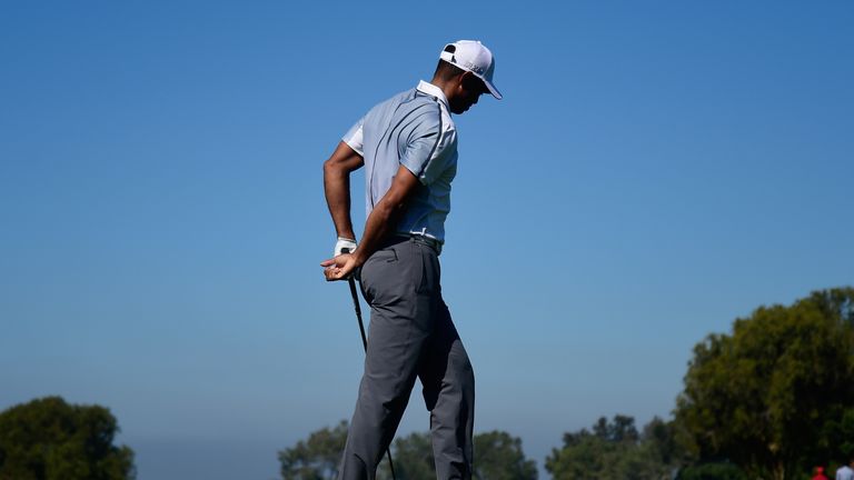 Back problems forced Woods to withdraw mid-round during the Farmers Insurance Open