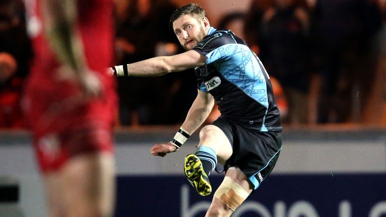Finn Russell of Glasgow kicks a penalty against Scarlets during their European Rugby Champions Cup match
