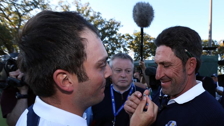 MEDINAH, IL - SEPTEMBER 30:  Francesco Molinari (L) and Jose Maria Olazabal celebrate after Europe defeated the USA 14.5 to 13.5 to retain the Ryder Cup du