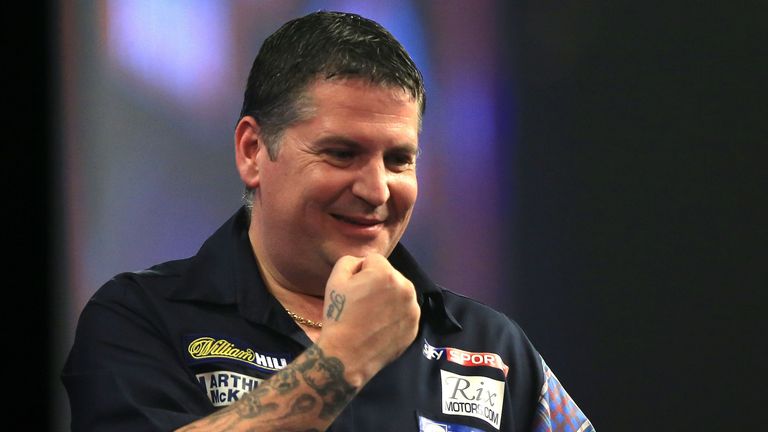 Gary Anderson celebrates his win during day one of the William Hill PDC Darts World Championship a
