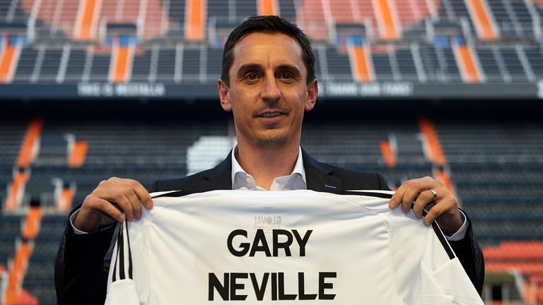 New Valencia head coach Gary Neville poses during his presentation