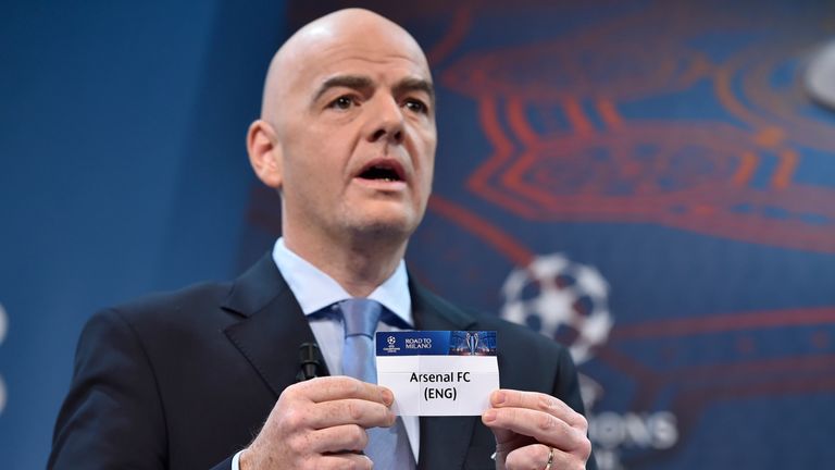 UEFA General Secretary Gianni Infantino shows the name of Arsenal during the draw for the Champions League round of sixteen in Nyon