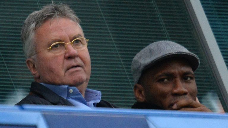 Chelsea's new interim manager Guus Hiddink (left) and former player Didier Drogba 