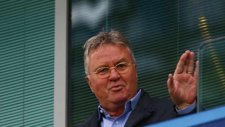 Chelsea interim manager Guus Hiddink waves to supporters