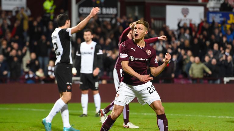 Hearts' Gavin Reilly celebrates his equaliser to make it 1-1 against Dundee United
