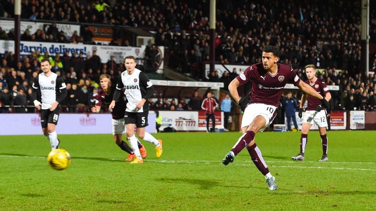 Hearts' Osman Sow scores for his side to make it 3-1 against Dundee United