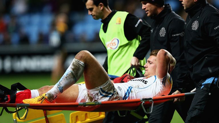 COVENTRY, ENGLAND - DECEMBER 05:  Henry Slade of Exeter Chiefs is stretched off during the Aviva Premiership match between Wasps and Exeter Chiefs at the R