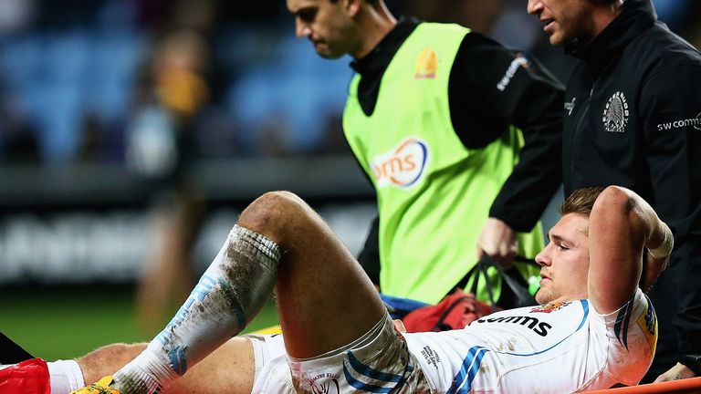 Henry Slade of Exeter Chiefs is stretched off during the Aviva Premiership match at Wasps