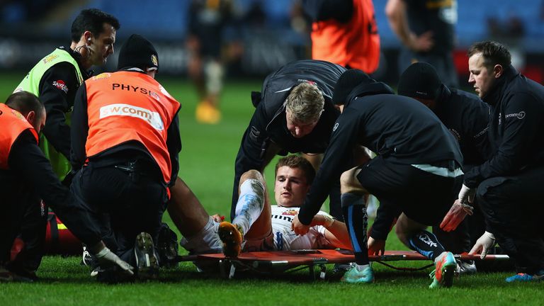 Henry Slade of Exeter Chiefs is stretched off during the Aviva Premiership match against Wasps