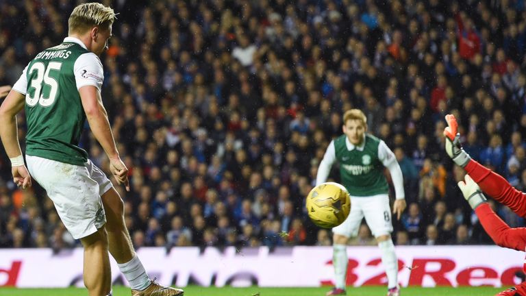 Jason Cummings chips Hibs into the lead at Ibrox