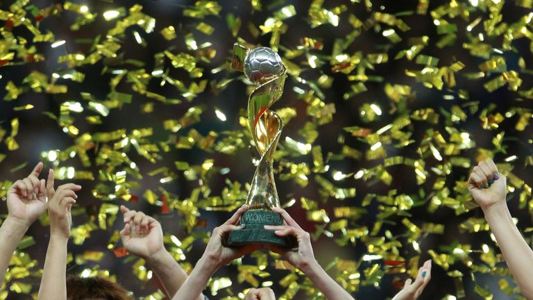 Homare Sawa lifts the World Cup after Japan's success in 2011