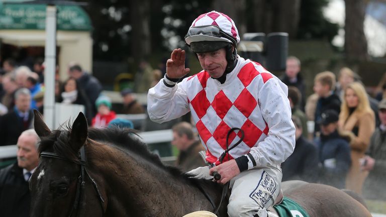 Flemenstar and Andrew Lynch return to the winner's enclosure after the Paddy Power `So Quick, So Easy iPhone App` Chase at Leopardstown.