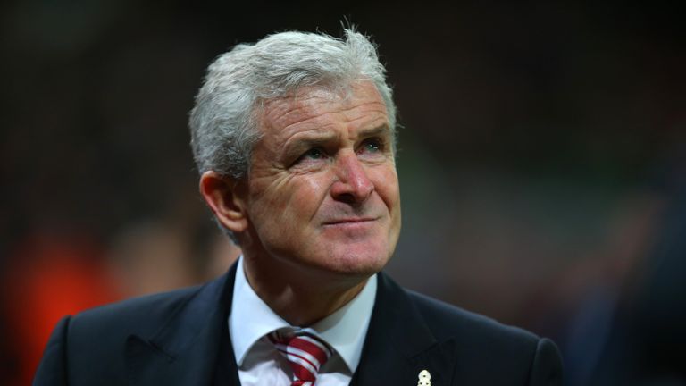 Stoke City Mark Hughes looks on following his sides victory during the Capital One Cup match between Stoke