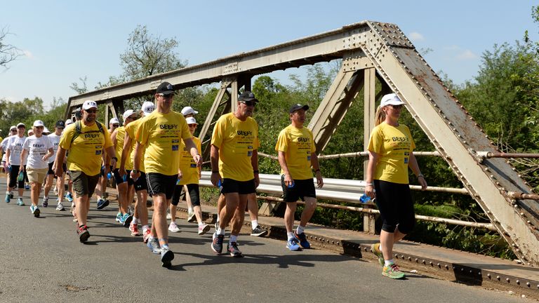 PRETORIA, SOUTH AFRICA - DECEMBER 17:  In this handout image provided by Philip Brown, Sir Ian Botham and his supporters walk during the 'Beefy Walking the