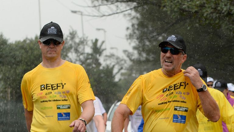 Ian Botham shrugs off a shower on his South Africa walk