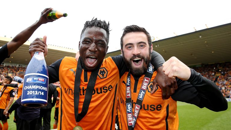 Nouha Dicko and Jack Price celebrate after the League One match between Wolves and Carlisle - Wolves are promoted from League One as 2013/14 Champions 