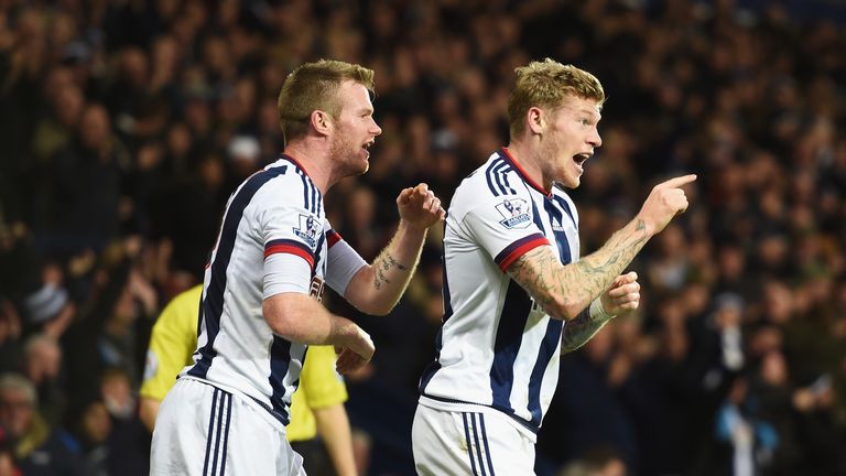 James McClean (R) of West Bromwich Albion celebrates scoring against Spurs