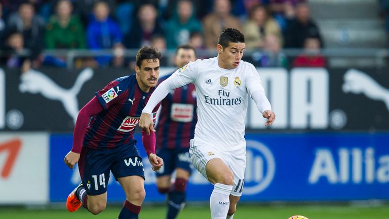 James Rodriguez of Real Madrid (right) duels for the ball with Daniel Garcia of SD Eibar 
