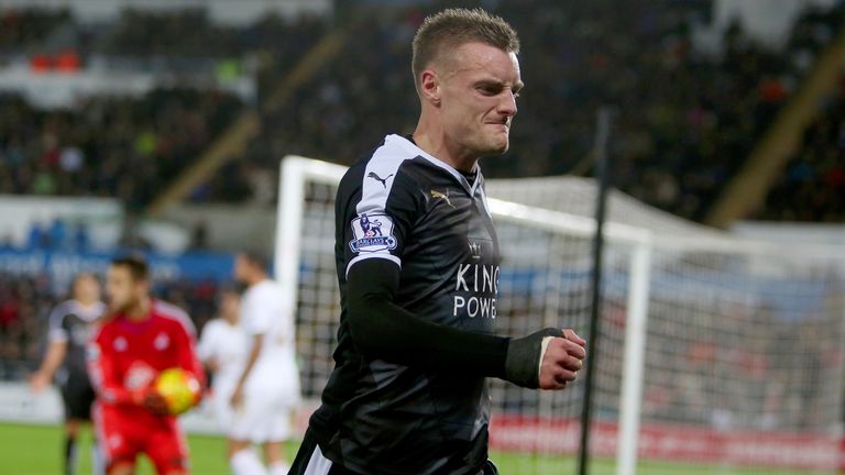 Leicester City striker Jamie Vardy kicks the advertising boards in frustration after missing a chance