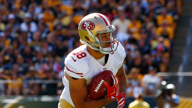 PITTSBURGH, PA - SEPTEMBER 20:  Jarryd Hayne #38 of the San Francisco 49ers fields a punt against the Pittsburgh Steelers