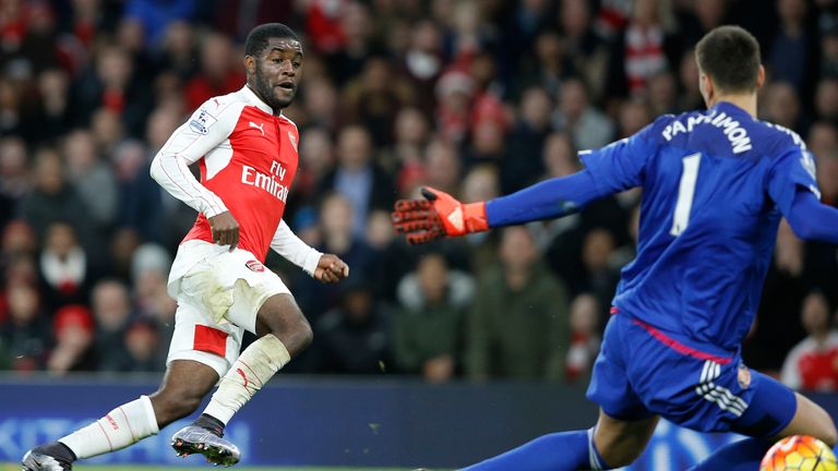 Joel Campbell (R) scores Arsenal's first goal during of the English Premier League football match against Sunderland