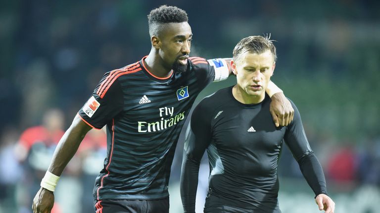 Johan Djourou and Ivica Olic of Hamburg