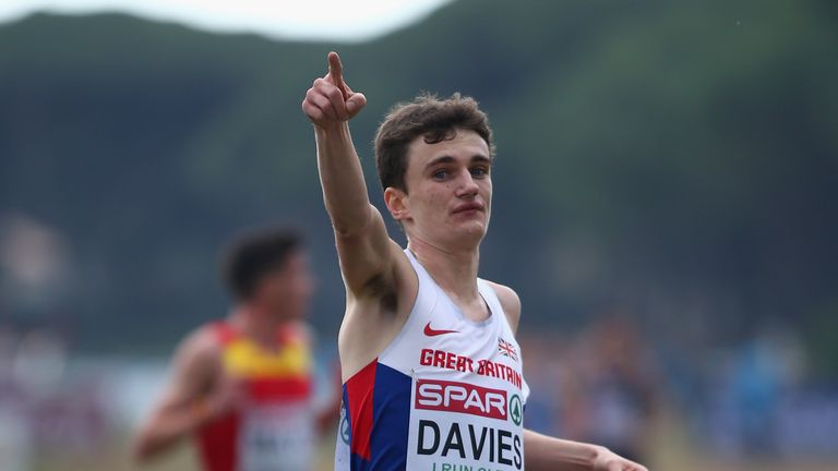 Jonathan Davies of Great Britain celebrates victory in the U23 Men's race during the European Cross Country Championships