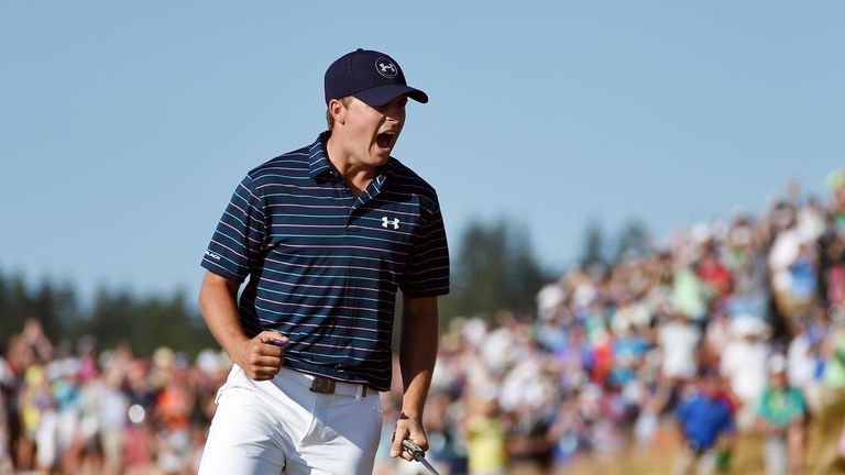 Jordan Spieth of the United States celebrates a birdie putt on the 16th green during the final round of the 115th U.S. Open