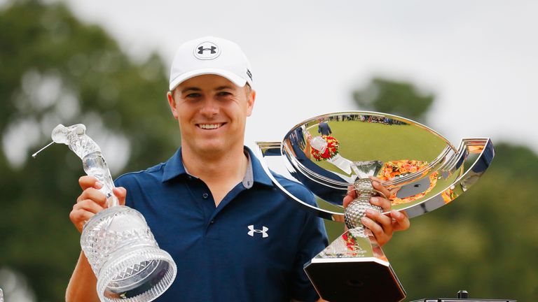 ATLANTA, GA - SEPTEMBER 27:  Jordan Spieth of the United States poses on the 18th green after winning both the TOUR Championship By Coca-Cola and the FedEx