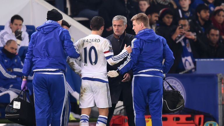 Jose Mourinho the manager of Chelsea speaks with Eden Hazard