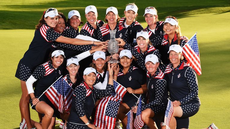 Team USA with Juli Inkster, captain of team USA hold the Solheim Cup trophy after the final day of The Solheim Cup at