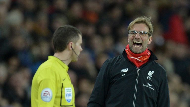 Liverpool's manager Jurgen Klopp (R) gestures