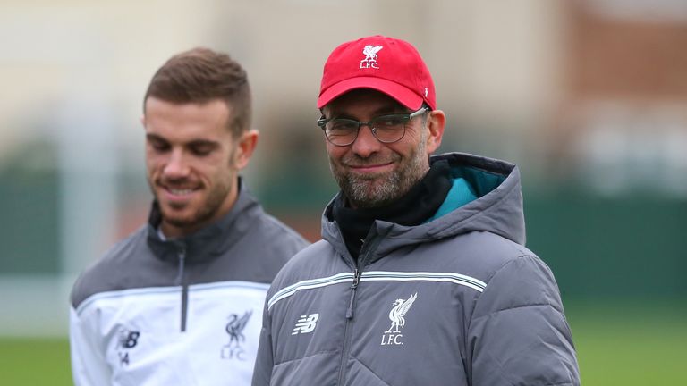 Liverpool boss Jurgen Klopp with club captain Jordan Henderson