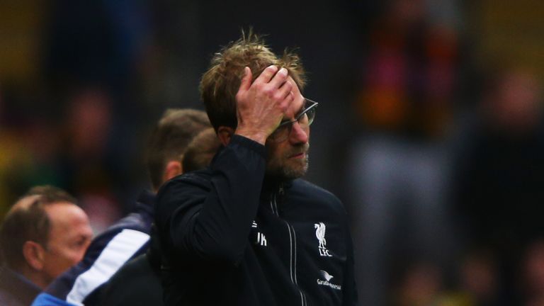 Jurgen Klopp manager of Liverpool reacts as Odion Ighalo of Watford scores their third goal during the Barclays Premier Le