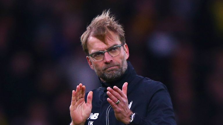 WATFORD, ENGLAND - DECEMBER 20:  Jurgen Klopp manager of Liverpool applauds the travelling fans after the Barclays Premier League match between Watford and