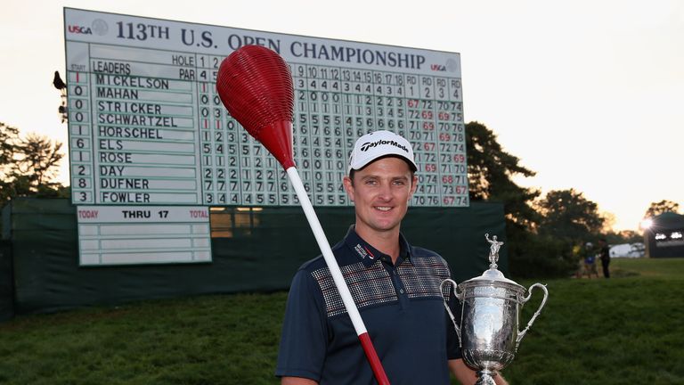 Justin Rose poses with the US Open title after 2013 victory