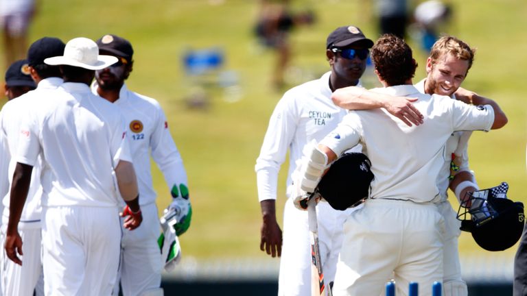 BJ Watling and Kane Williamson celebrate a happy day for New Zealand