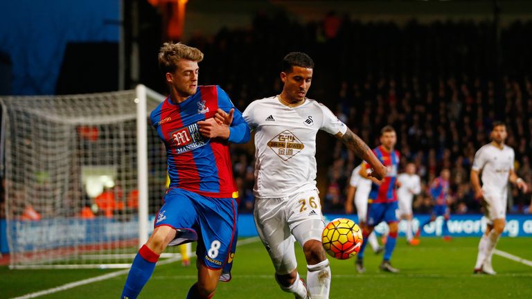 Kyle Naughton of Swansea City and Patrick Bamford of Crystal Palace compete for the ball