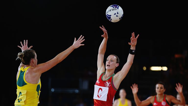 Kyra Jones of Wales passes the ball out during the Preliminary Round Group B match between Australia