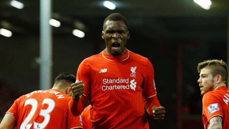 Liverpool's Christian Benteke (centre) celebrates scoring the opening goal against Leicester City at Anfield