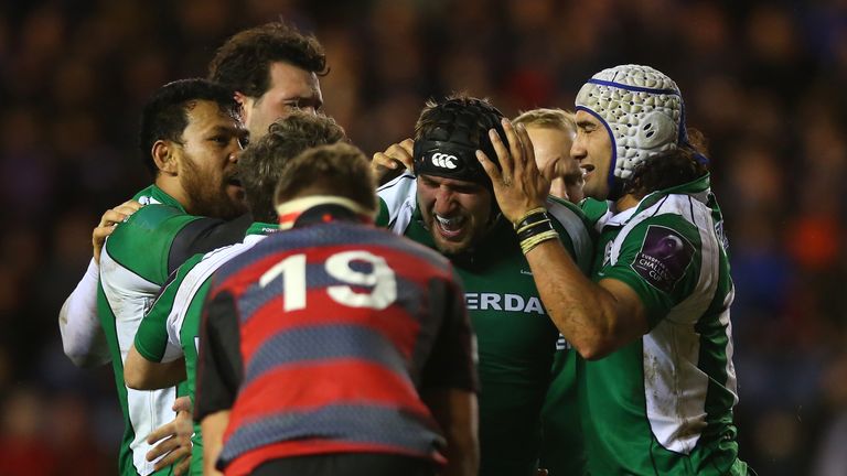 Tom Smallbone of London Irish is congratulated on scoring his try 