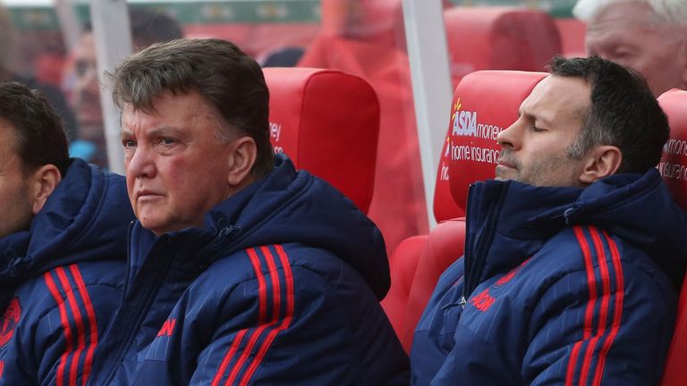 Manchester United manager Louis van Gaal and assistant manager Ryan Giggs watch from the bench