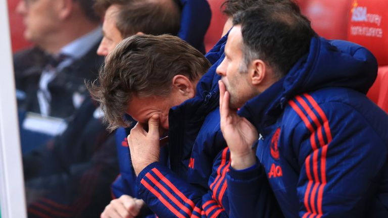 Manchester United manager Louis van Gaal sits dejected on the bench during the Barclays Premier League match at the Britannia Stadium, Stoke