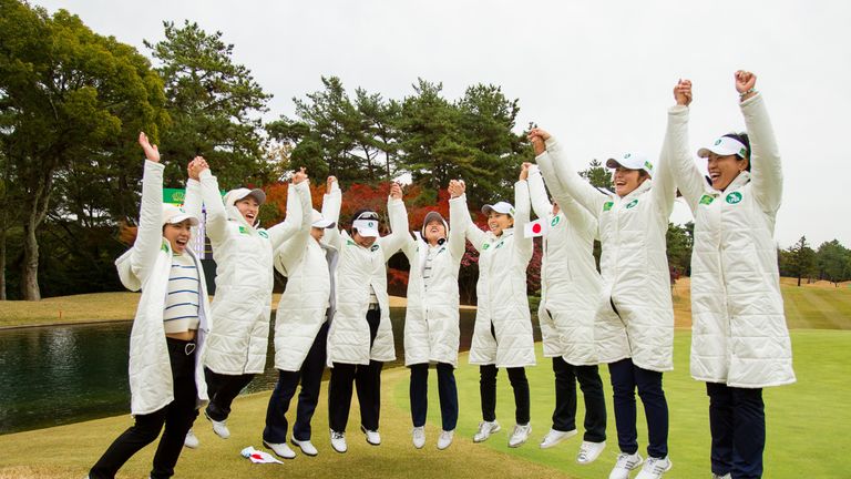 The Japan team jump for joy after their victory in The Queens