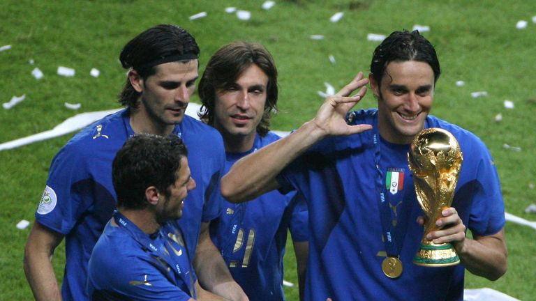 Luca Toni (right) celebrates Italy's World Cup win in 2006 with team-mates Simone Perrotta, Vincenzo Iaquinta and Andrea Pirlo