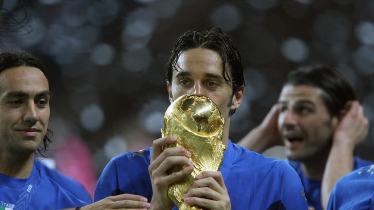 Italian forward Luca Toni celebrates after winning the World Cup with Italy
