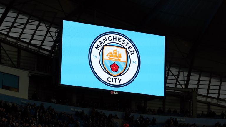 The new Manchester City club crest is displayed on the big screen before the Premier League match against Sunderland at the Etihad Stadium.